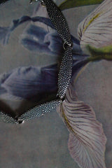 My Petal Bracelet with seven oxidised silver textured petals linked in a chain