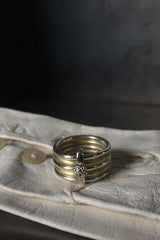 My wide striking Five Band Cauliflower Ring has 5 plain bands and a cauliflower button link