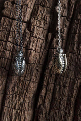 Pair of my Tiny Bee pendants in oxidised silver and silver