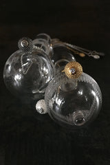 A special birthstone pendant for April in three metal colours – its centrepiece is a tactile textured ball with a glistening Cubic Zirconia at the base.