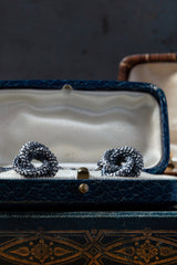 My Love Knot cufflink in oxidised silver uses a bobble texture and interlocking shape that symbolises never-ending love