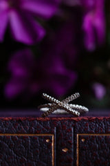 My Kiss Cross Ring is formed from a cross or kiss mounted on a simple band