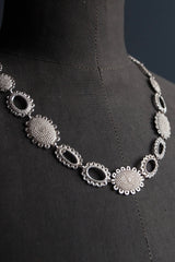 My Baroque Necklace in silver features 24 highly decorated oval motifs, inspired by antique lace