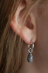 My Spotted Teardrop Drop Earrings are strung from a hooped sleeper worn in oxidised silver