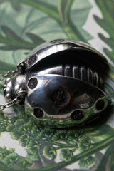 My Ladybird Pendant Necklace has a textured body and head with articulated wings and minute legs on the reverse