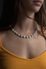 My Sunflower Necklace worn in silver links sunflower heads to create a pleasing chain with a decorated reverse