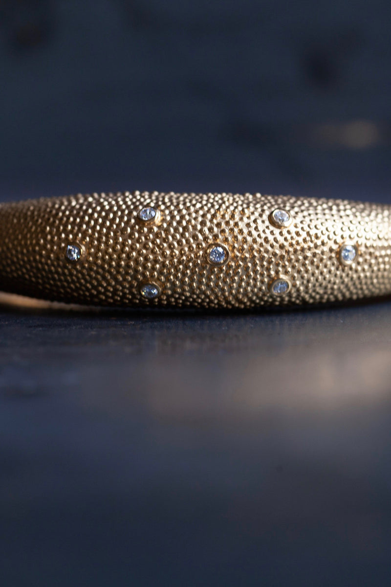 My Axolotl Cuff Bangle in gold plated silver with 7 diamonds and by my signature bobbled texture