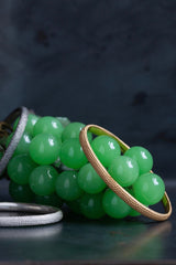 Three of my oval Dotty Bangles in silver, oxidised silver and gold plated silver decorated with my signature dotted texture