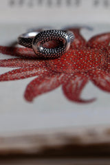 My Squid Ring in oxidised silver inspired by sea creatures contrasts smooth and spotted textures