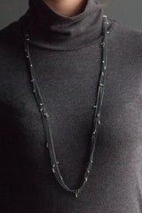 My Five Strand Trace and Pip Necklace comprises five delicate oxidised silver chains, decorated with miniature bright silver plated pips