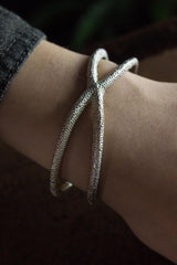 My Starfish Bangle worn in silver takes a sculptural shape inspired by dried starfish