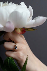 A one off Blue Spinel in 18ct yellow gold cup setting with a white diamond on 18ct yellow gold band