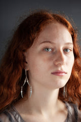 A daring new design in oxidised silver and silver inspired by the details and shapes of a dragonfly.