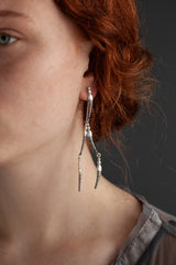 A daring new design in oxidised silver and silver inspired by the details and shapes of a dragonfly.