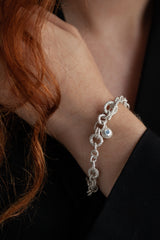 A chain bracelet made of recycled off cuts - personalise the charm with a gemstone