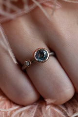 A one off Lilac Spinel in 18ct rose gold cup setting with a white diamond on 18ct white gold band