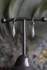 My Feather Drop Earrings in silver are hung with a feather charm