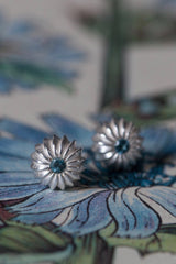 My November London Blue Topaz Birthstone Satsuma Studs are subtly striped and set with gemstones