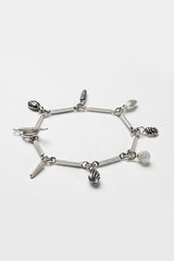 My Single Twisted Link Bracelet features 7 Mixed Pod Charms inspired by nature