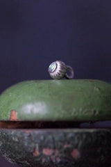 A delicate striped gemstone charm – choose a Peridot for your August birthday.