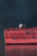 A delicate striped gemstone charm – choose a Ruby for your July birthday.