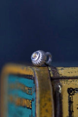 A delicate striped gemstone charm – choose a yellow Topaz for your November birthday.