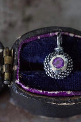 An elegant charm with a bobbled pattern – choose an amethyst for your February birthday