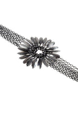My Gerbera Bracelet in oxidised silver features a large stylised gerbera flower with movable petal charms 