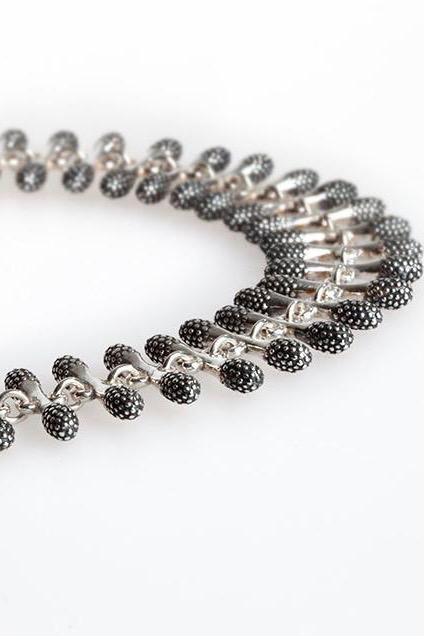 Closeup of my Spot the Matchstick Bracelet is formed from small bars decorated with bobble texture