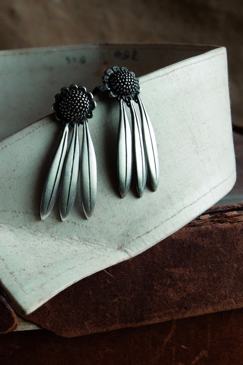 My Aster Daisy Drop Earrings feature a domed beaded flower head with three petals dropping down 