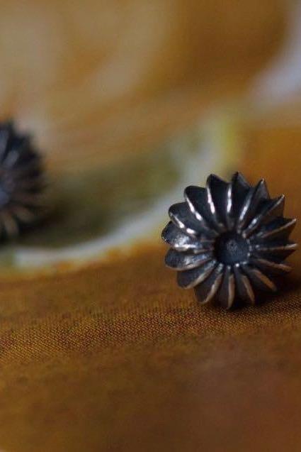 My Satsuma Studs in oxidised silver are decorated with subtle stripes that catch the light