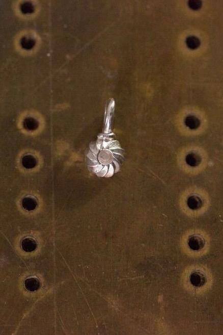 Swirling Sepal Charm