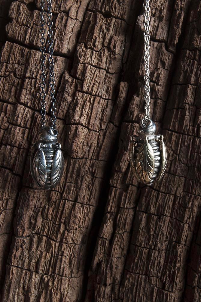 Pair of my Tiny Bee pendants in oxidised silver and silver 