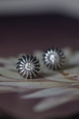 My April Diamond Birthstone Satsuma Studs are subtly striped and set with gemstones