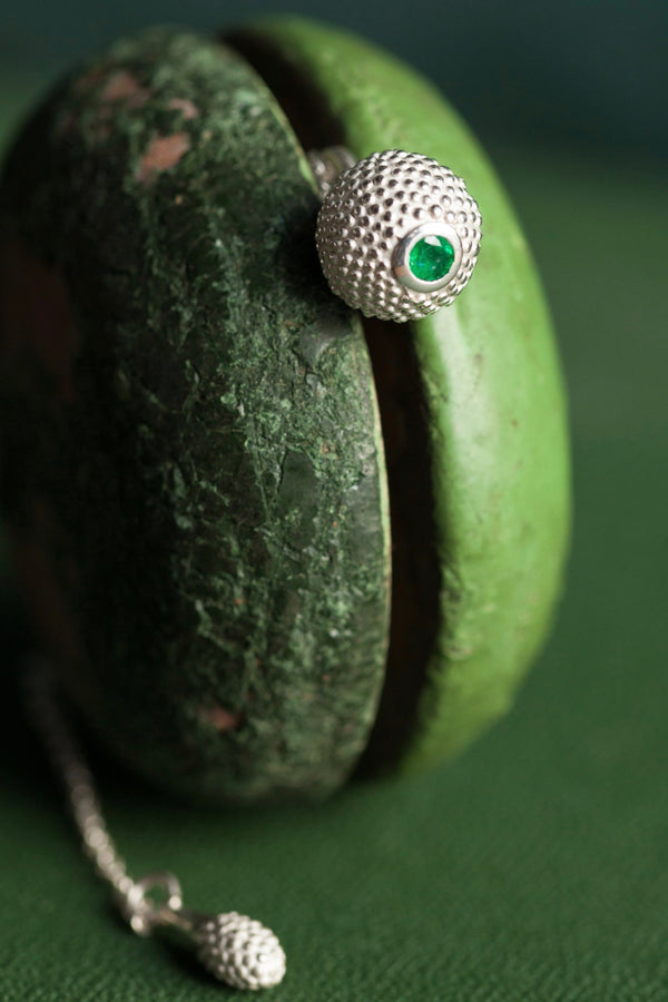 A special birthstone pendant for August – its centrepiece is a tactile textured ball with a glistening Peridot at the base. The chain can be worn at two lengths and is finished with a delicate teardrop charm.