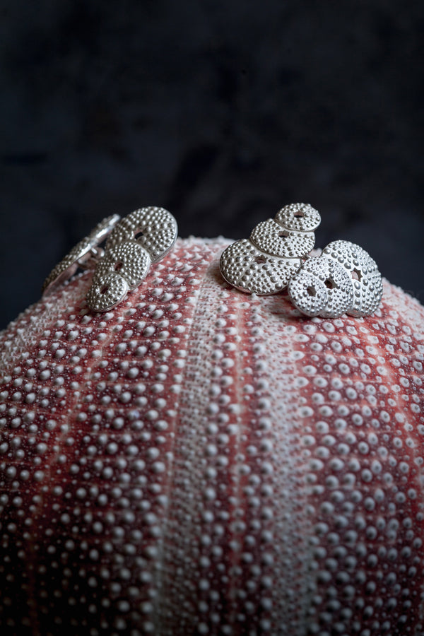 My Urchin Cufflinks feature a trio of tapering urchin motifs textured all over with small beads of silver that sparkle