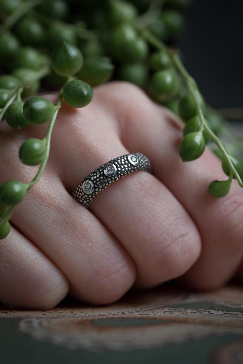 My quirky Diamond Octopus Ring worn in oxidised silver is decorated with my bobble texture and 3 diamonds