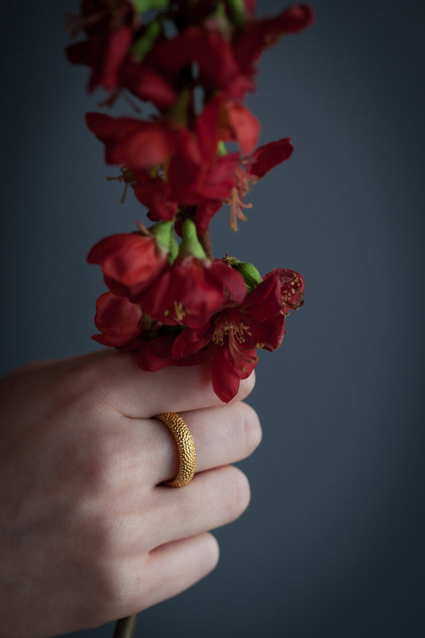 My Spotted Band Ring worn in gold plated silver has a classic shape redefined by my signature spotted texture