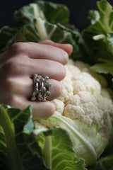 My large Cauliflower Trio Ring has 3 stacking bands worn by model in silver