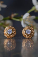 My Bobbled Pollen Stud Earrings in gold plated silver  are set with Cubic Zirconia April's birthstone