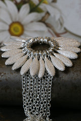 My Spotted Daisy Bracelet in all silver features a large bobbled petal charm flower 