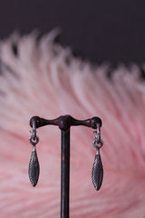 My Feather Drop Earrings in oxidised silver are hung with a feather charm 