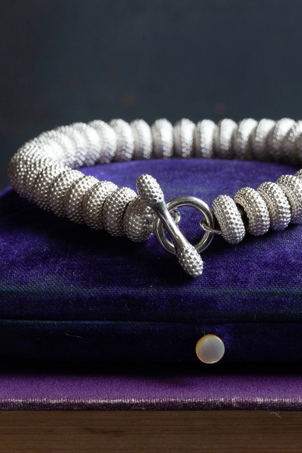 My Spotted Sweetie Bracelet is formed from textured beads with a pleasing tactile weight. 