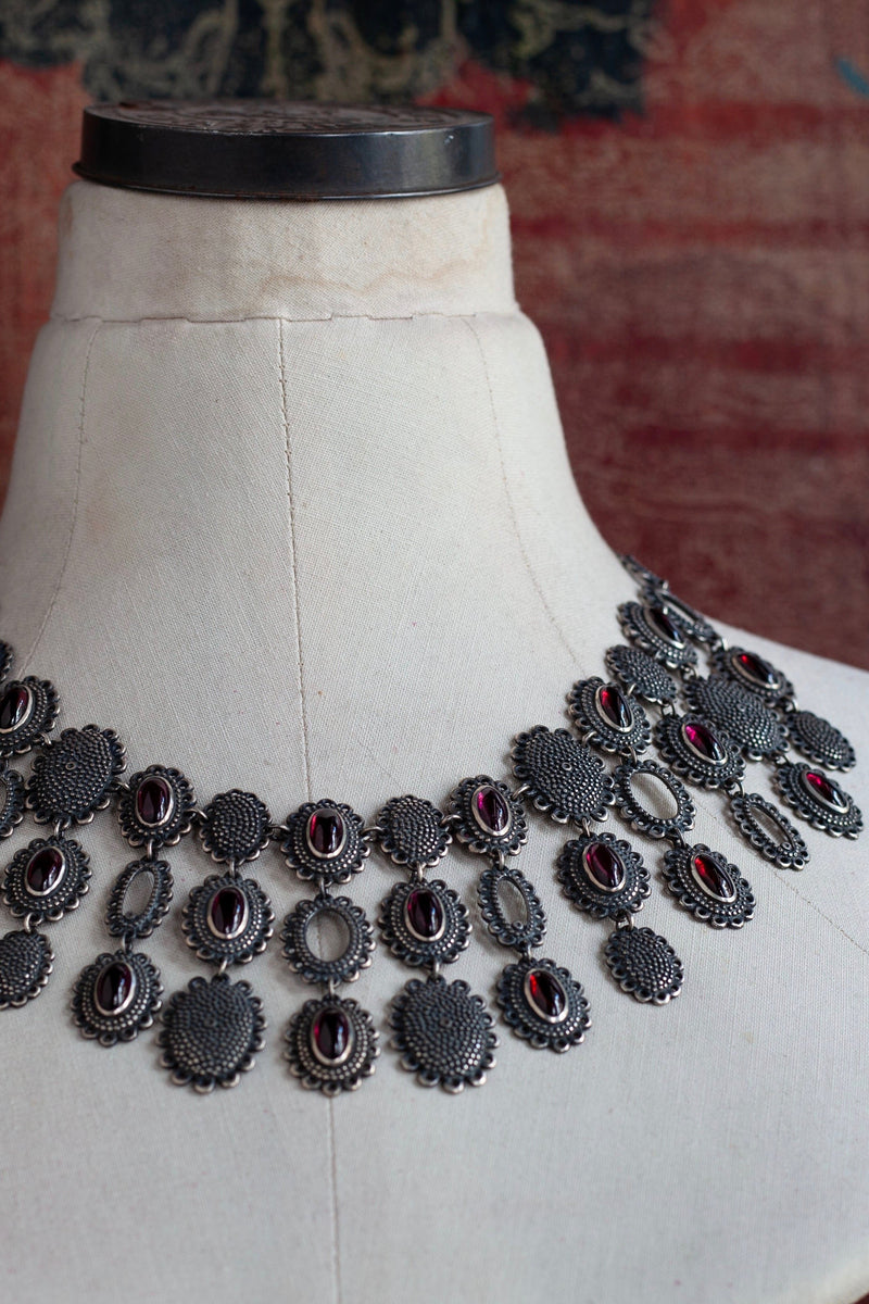 My Garnet Baroque Necklace, inspired by antique lace and ruffs on a dress stand