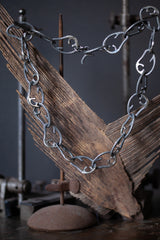 A link and chain necklace with organically shaped links inspired by angel’s wings.