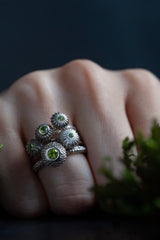 My August Peridot Five Pollen Stacking Ring Set worn - 5 pollen charms set with Peridots August's birthstone