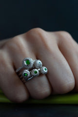 My January Tsavorite Green Garnet Five Pollen Stacking Ring Set worn by model