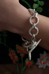 My striking Textured Hoop Bracelet features oversized hoops joined by smaller shiny links 