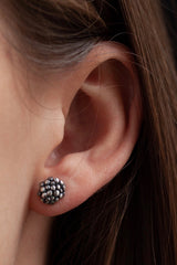 My Small Raspberry Stud Earrings worn in oxidised silver