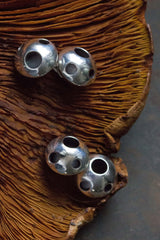 My Mushroom Cufflinks have a pleasing domed shape decorated with deep spots and joined with chains